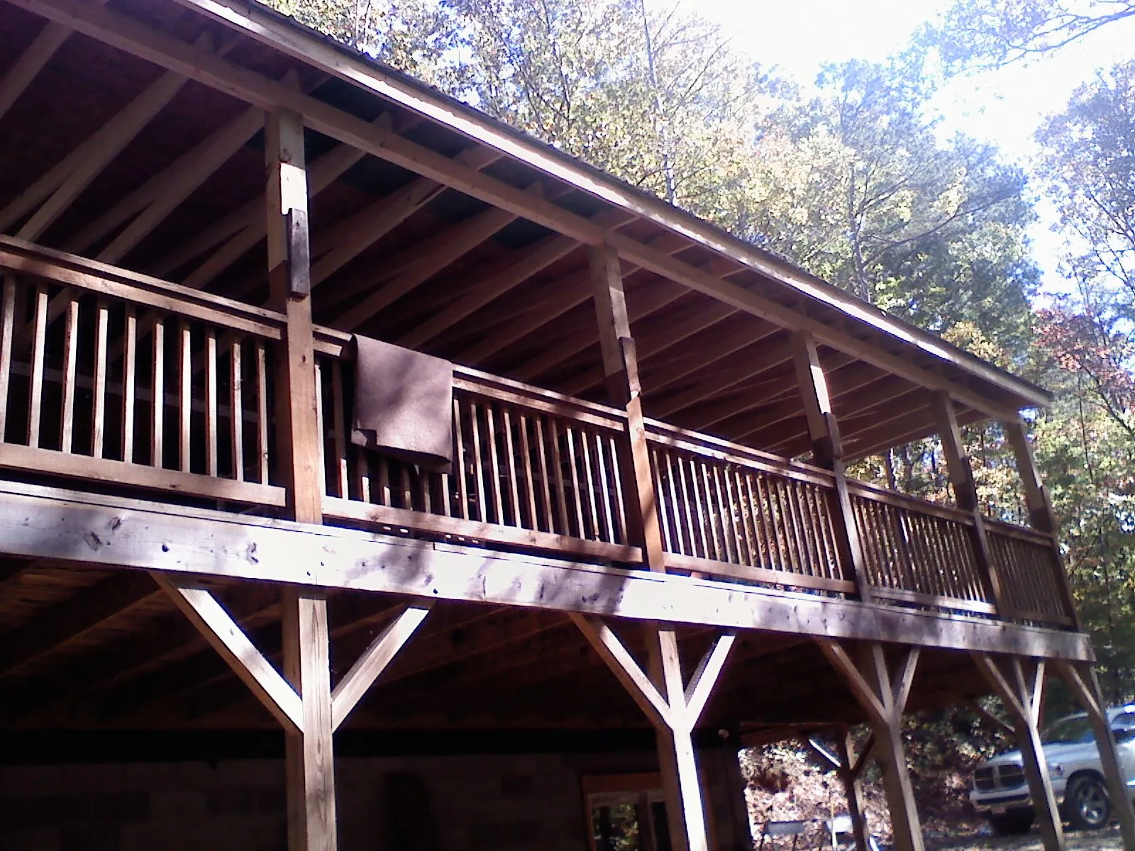 Timber framing under a new elevated porch and deck — Roof Leak Repair in East Helena by Roofing Brothers
